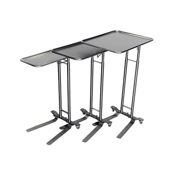 A set of three tables with wheels on them.