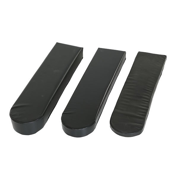 A set of three black rubber pads for the back of a chair.