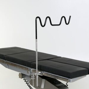 A black and silver table with some wires hanging from it