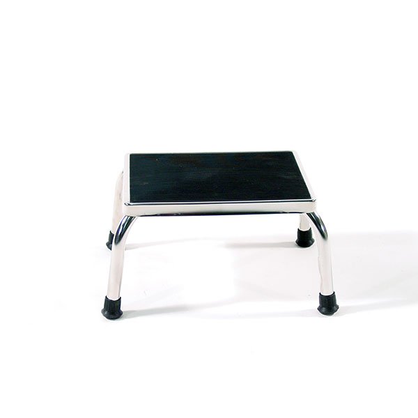 A black and white step stool on top of a floor.