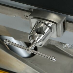 A close up of the handle on an industrial machine