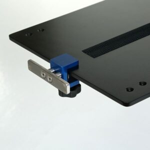 A close up of the blue attachment on a black table