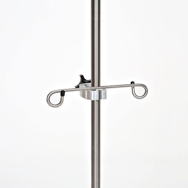 A close up of a pole with two hooks
