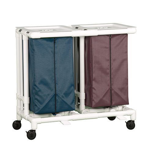 A white cart with two bags on top of it.