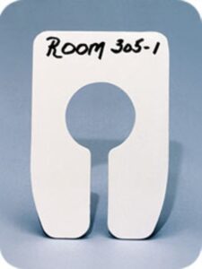 A white paper holder with the words room 3 0 5-1 written on it.