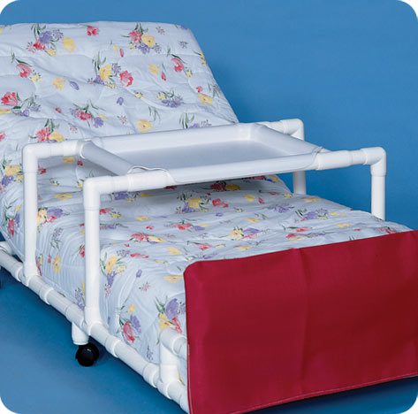 A bed with a tray on top of it.
